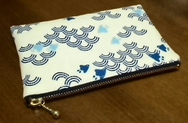 zippered pouch with wave and plovers