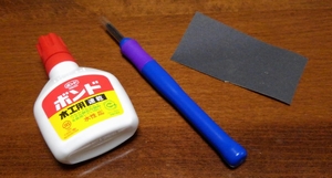 engraving knife, glue and sandpaper